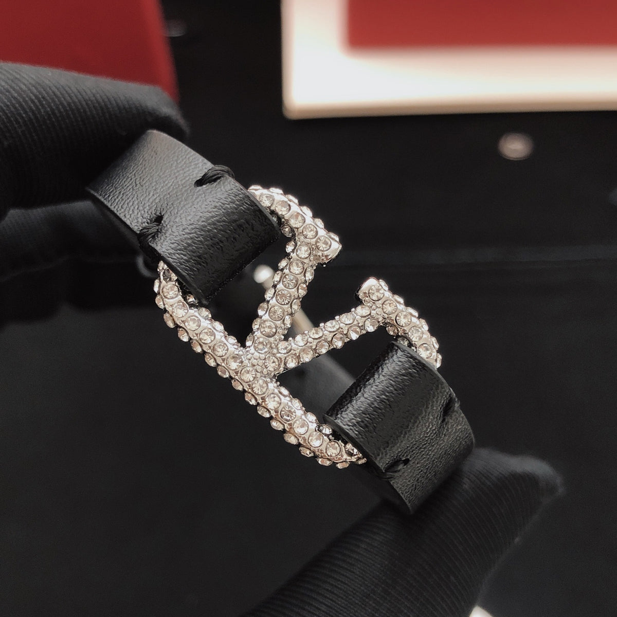 Signature Emblem Bracelet in Gold-Tone – Black front view