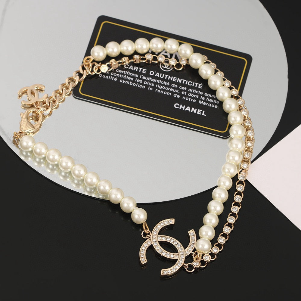 Double-C Emblem Pearl-Detail Pendant Necklace – Pearl Detail – Design 040 close-up detail