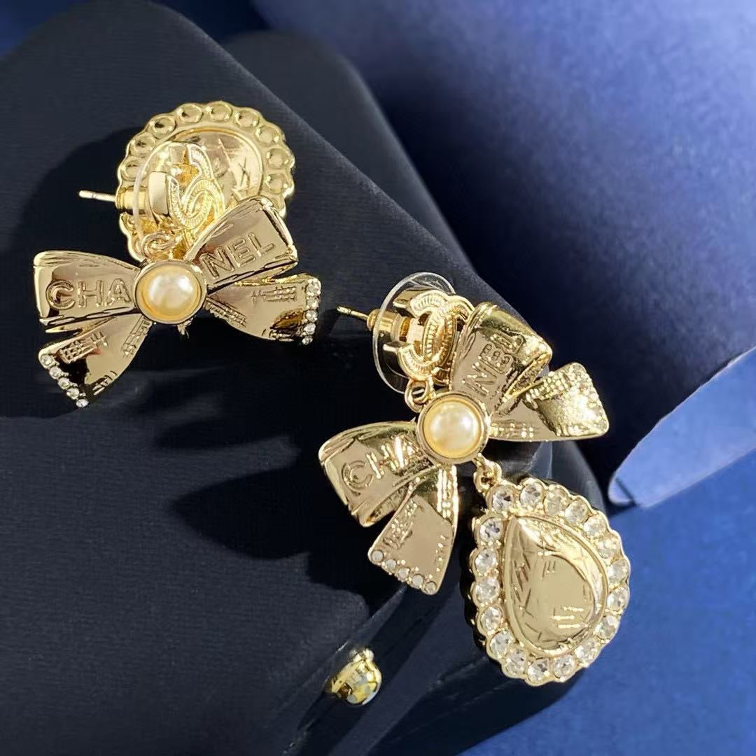Double-C Emblem Stud Earrings in Gold-Tone – Design 038 styled product view