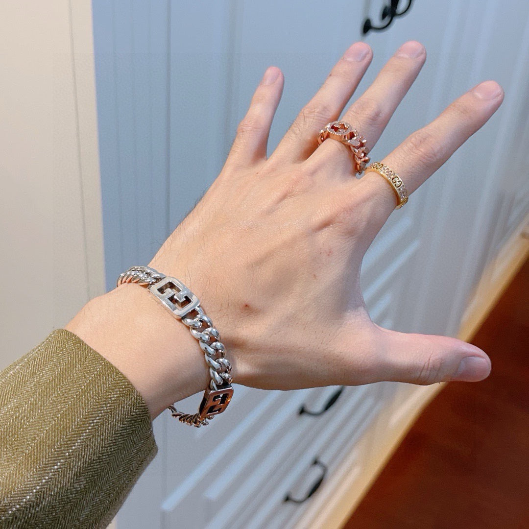 Geometric Emblem Bracelet in Polished Metal-Tone – Design 101 detail view
