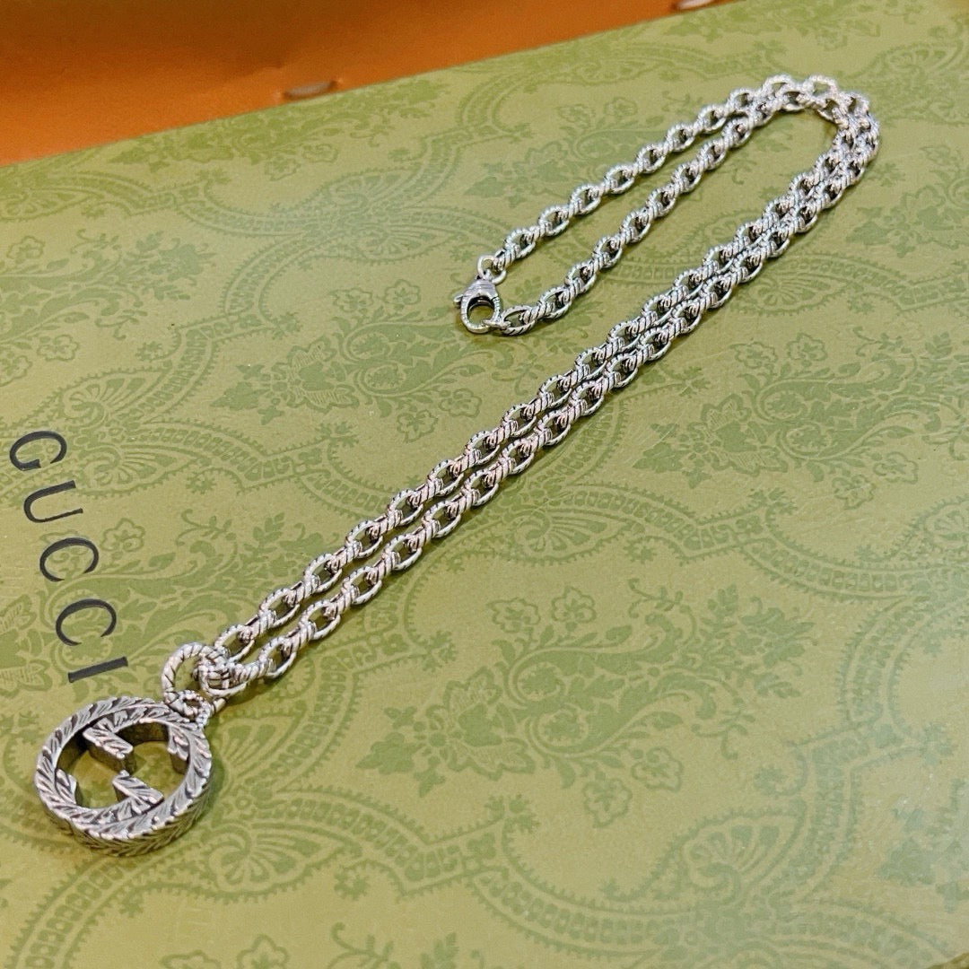 Double-G Emblem Pendant Necklace in Polished Metal-Tone – Design 098 close-up detail