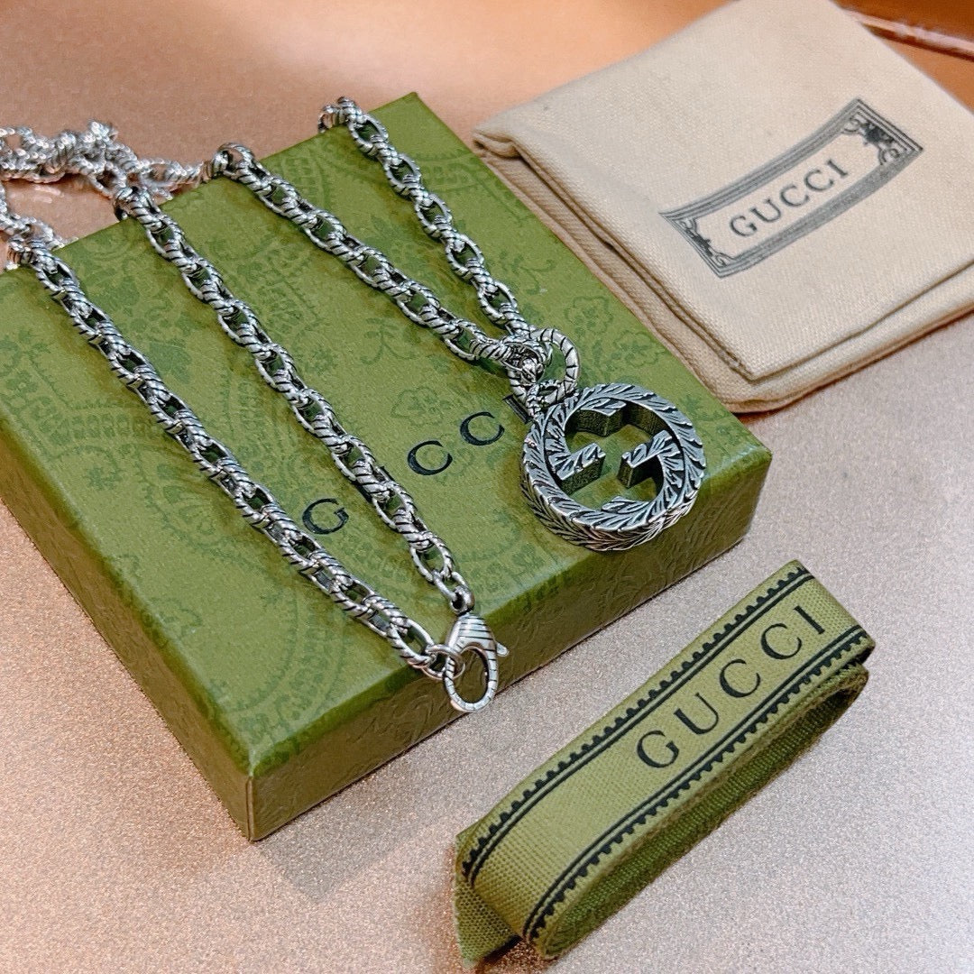 Double-G Emblem Pendant Necklace in Polished Metal-Tone – Design 098 detail view