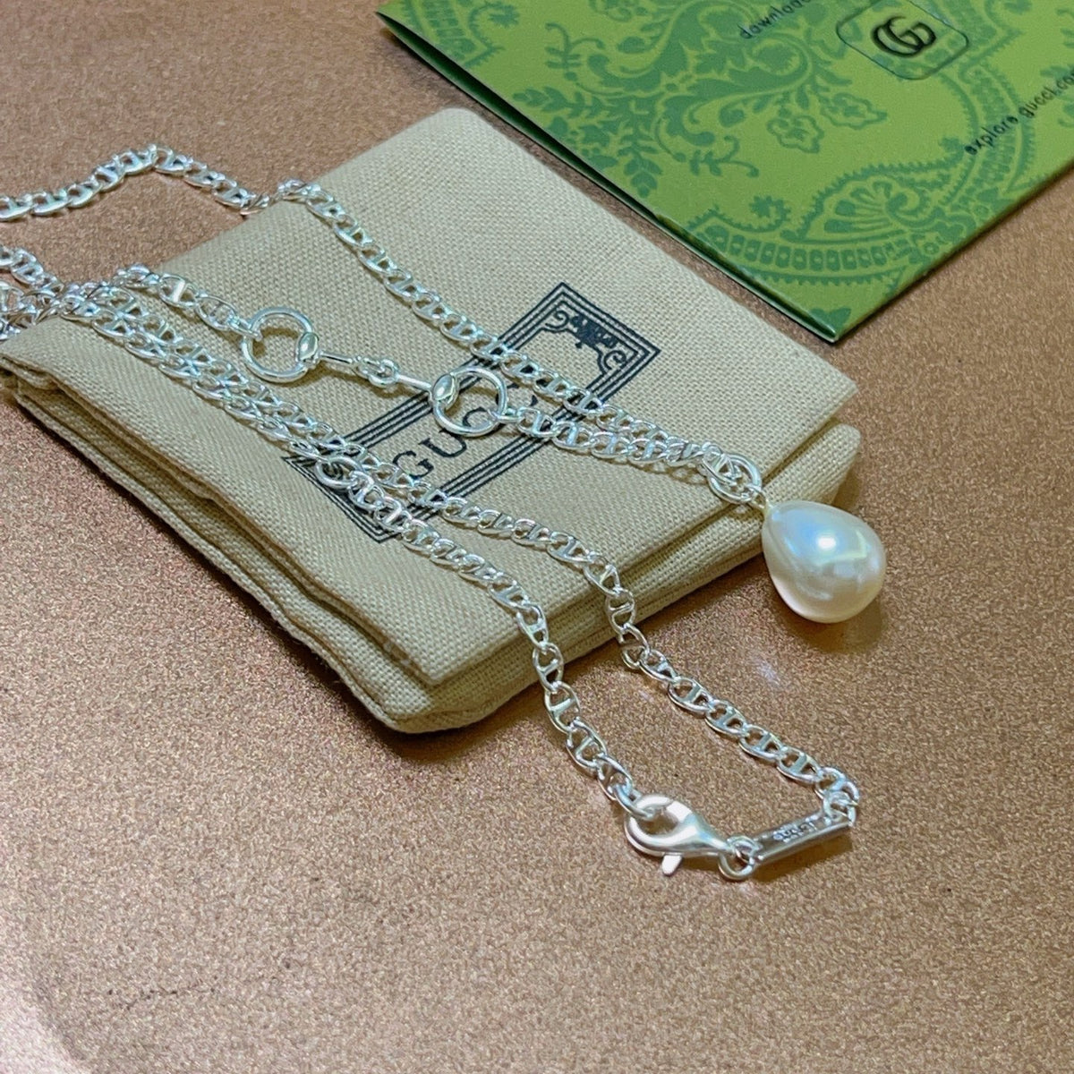 Double-G Emblem Pendant Necklace in Polished Metal-Tone – Design 204 close-up detail
