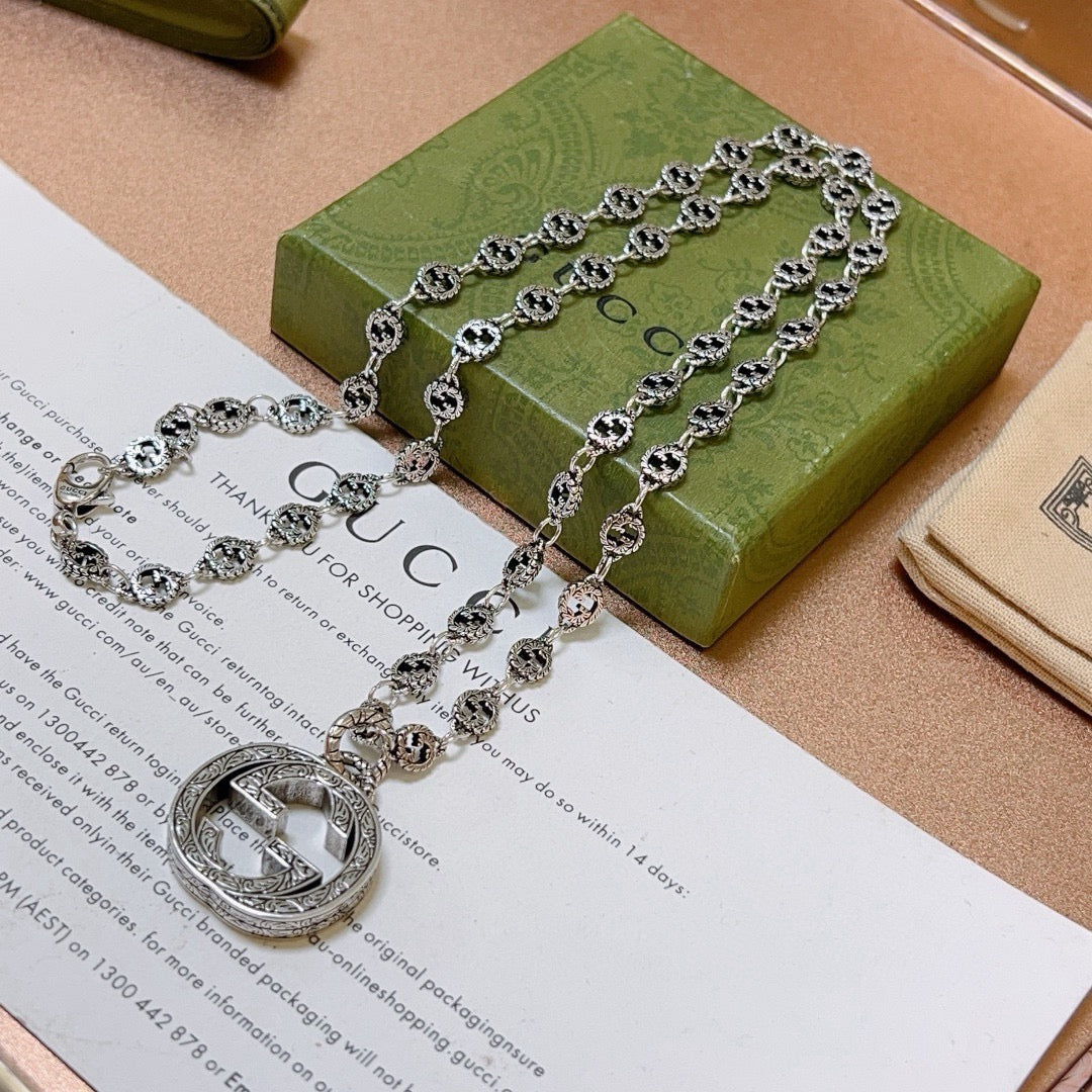Double-G Emblem Pendant Necklace in Polished Metal-Tone – Vintage Detail – Design 059 front product view