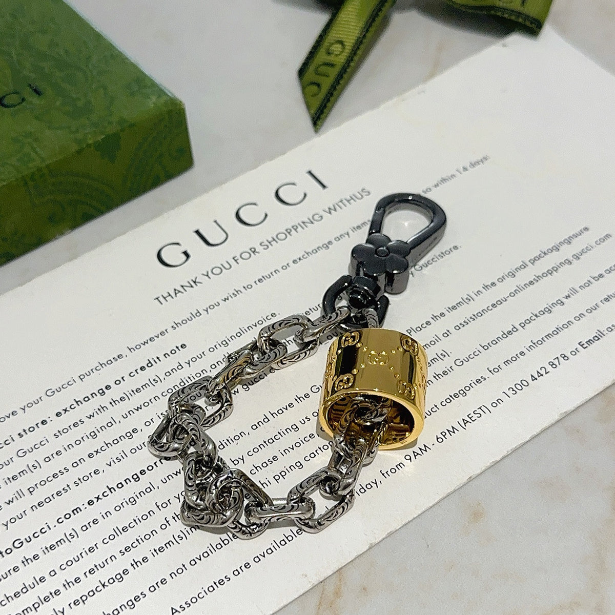 Double-G Emblem Keychain in Polished Metal-Tone – Design 020 detail view
