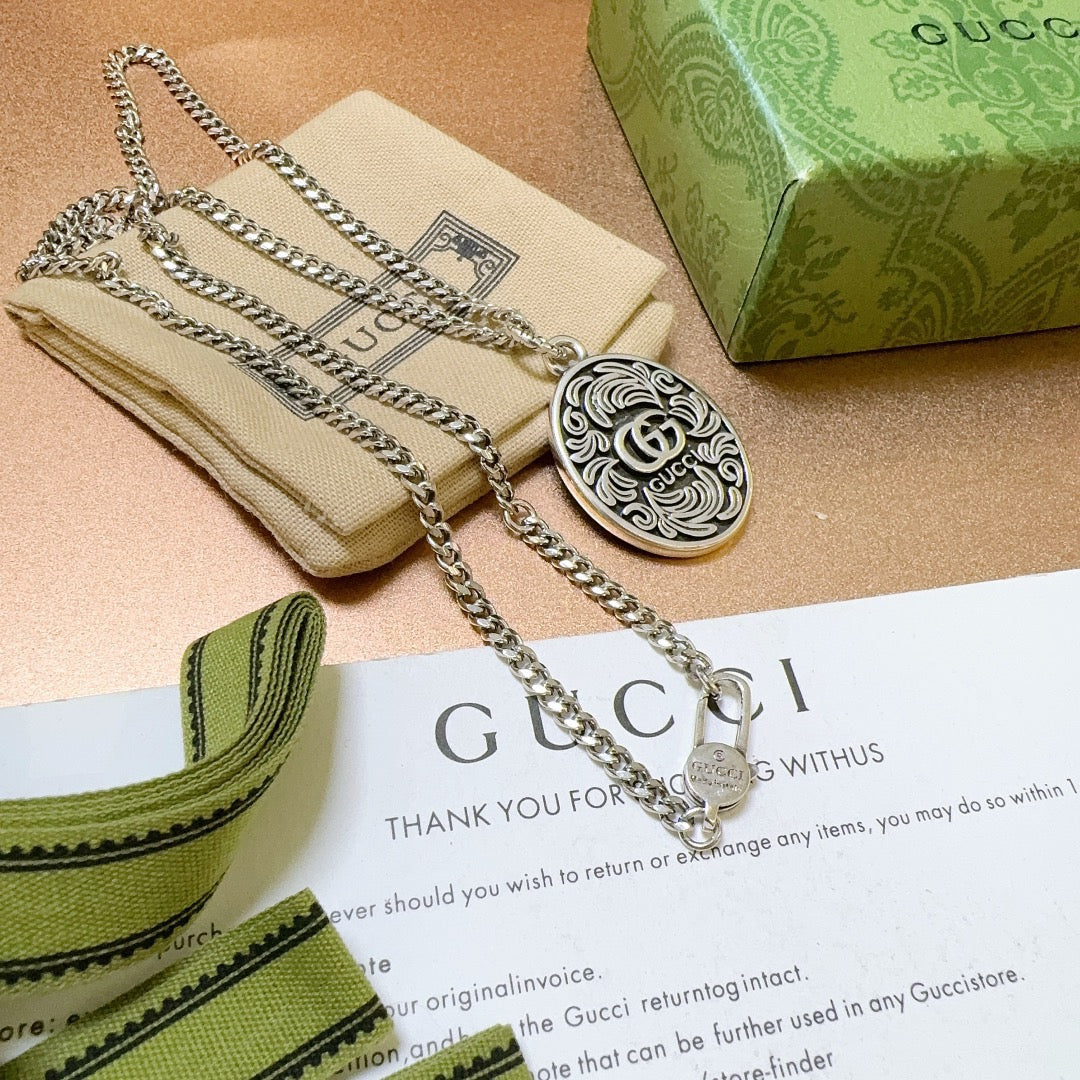 Double-G Emblem Pendant Necklace in Polished Metal-Tone – Design 192 close-up detail