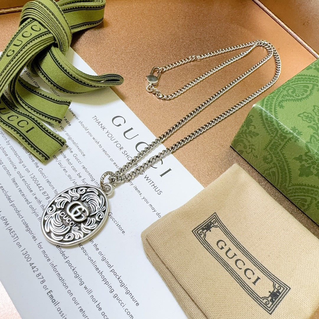 Double-G Emblem Pendant Necklace in Polished Metal-Tone – Design 093 front product view