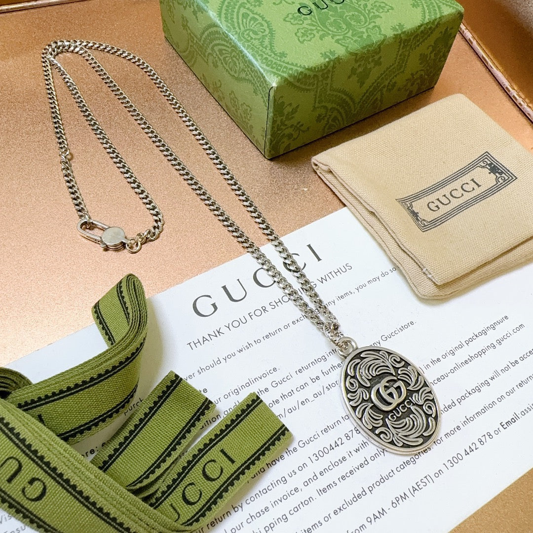 Double-G Emblem Pendant Necklace in Polished Metal-Tone – Design 200 main product view