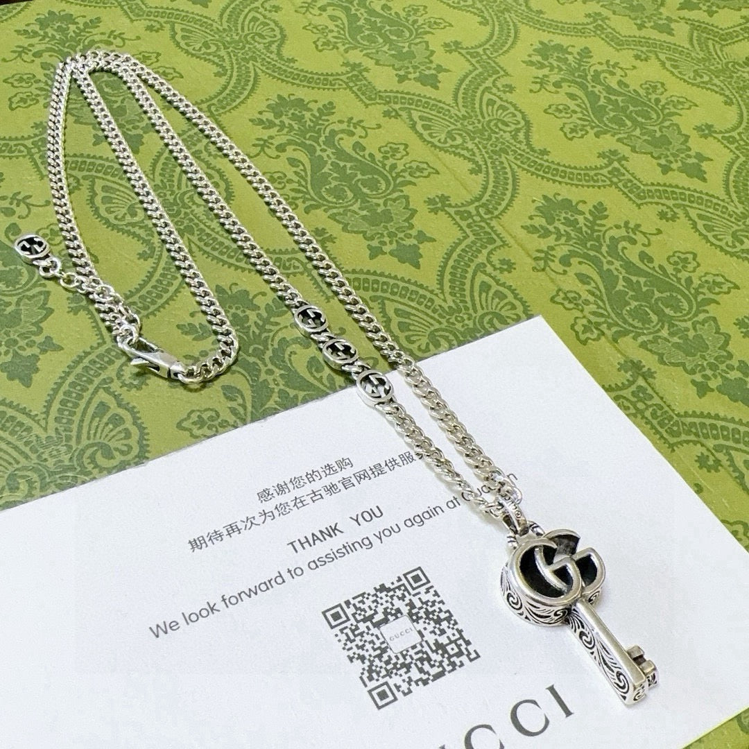 Double-G Emblem Pendant Necklace in Polished Metal-Tone – Vintage Detail – Design 022 main product view