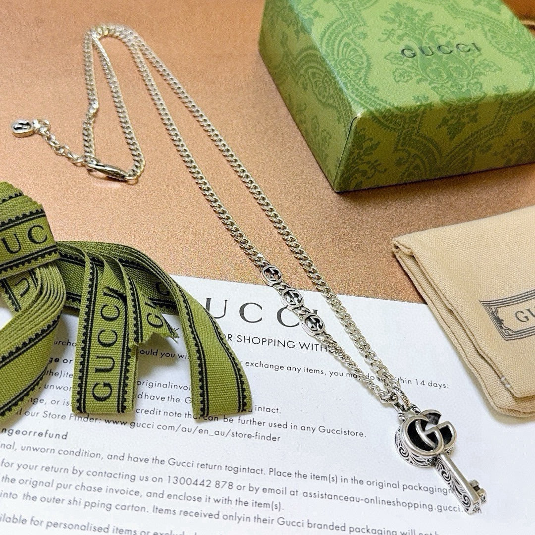 Double-G Emblem Pendant Necklace in Polished Metal-Tone – Vintage Detail – Design 058 front product view