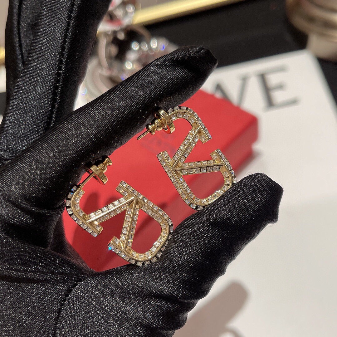 Signature Emblem Crystal-Accent Statement Earrings close-up view