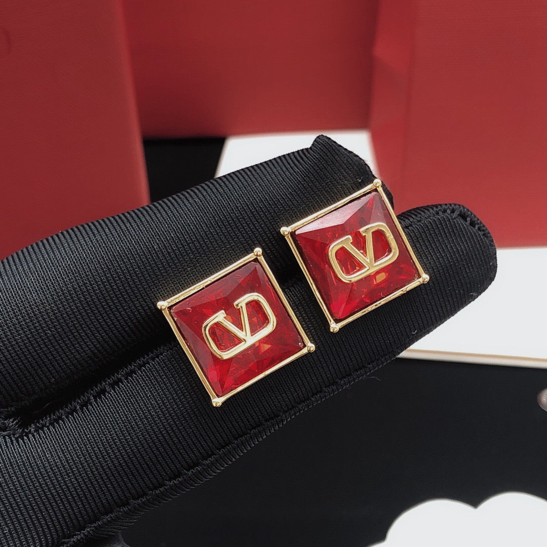 Signature Emblem Stud Earrings in Polished Metal-Tone – Red – Design 02 side detail