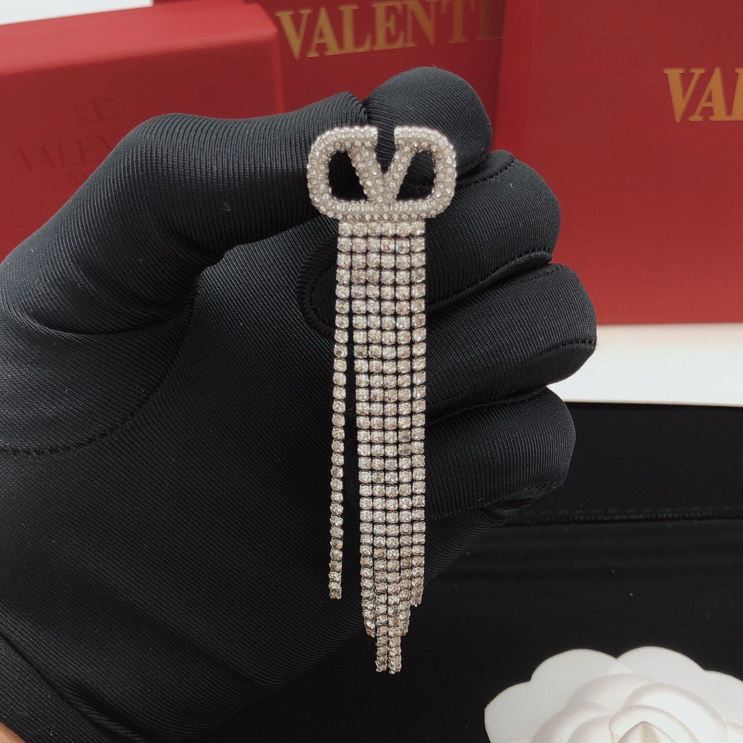 Signature Emblem Crystal-Accent Stud Earrings – Design 05 styled detail