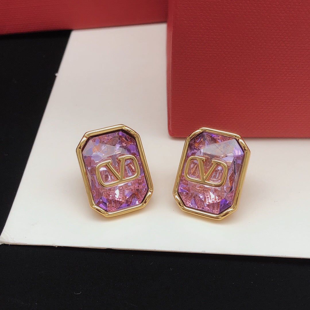 Signature Emblem Crystal-Accent Stud Earrings – Purple front view