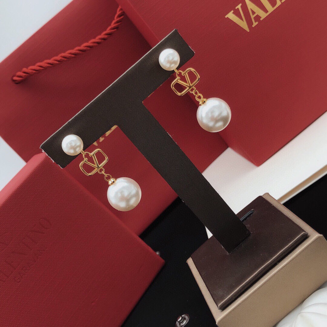 Signature Emblem Stud Earrings in Gold-Tone – Design 07 close-up view