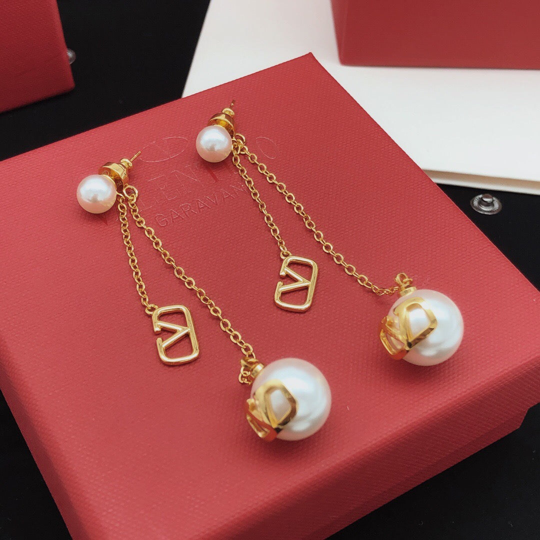 Signature Emblem Stud Earrings in Gold-Tone – Design 06 close-up view