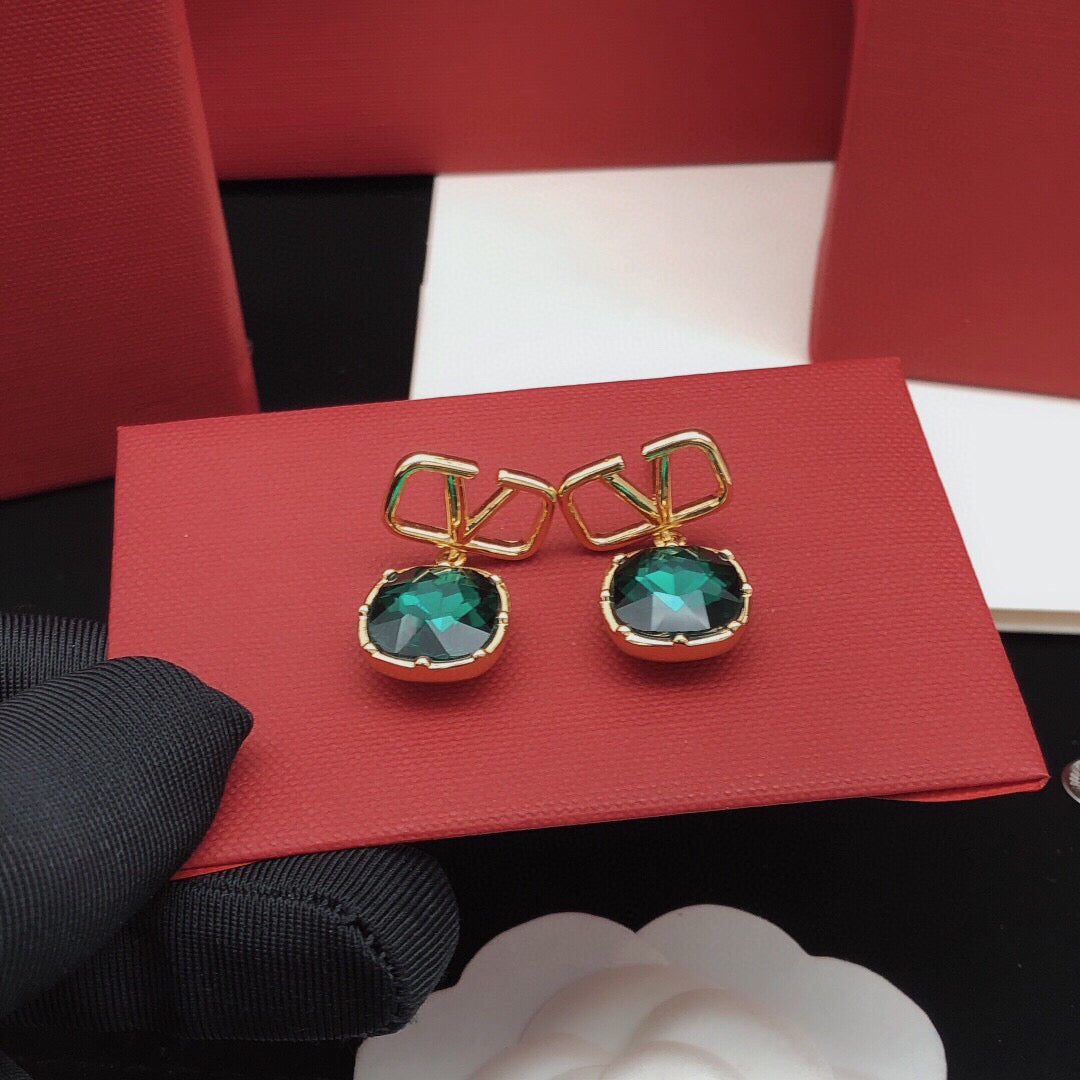 Signature Emblem Crystal-Accent Stud Earrings – Red styled detail