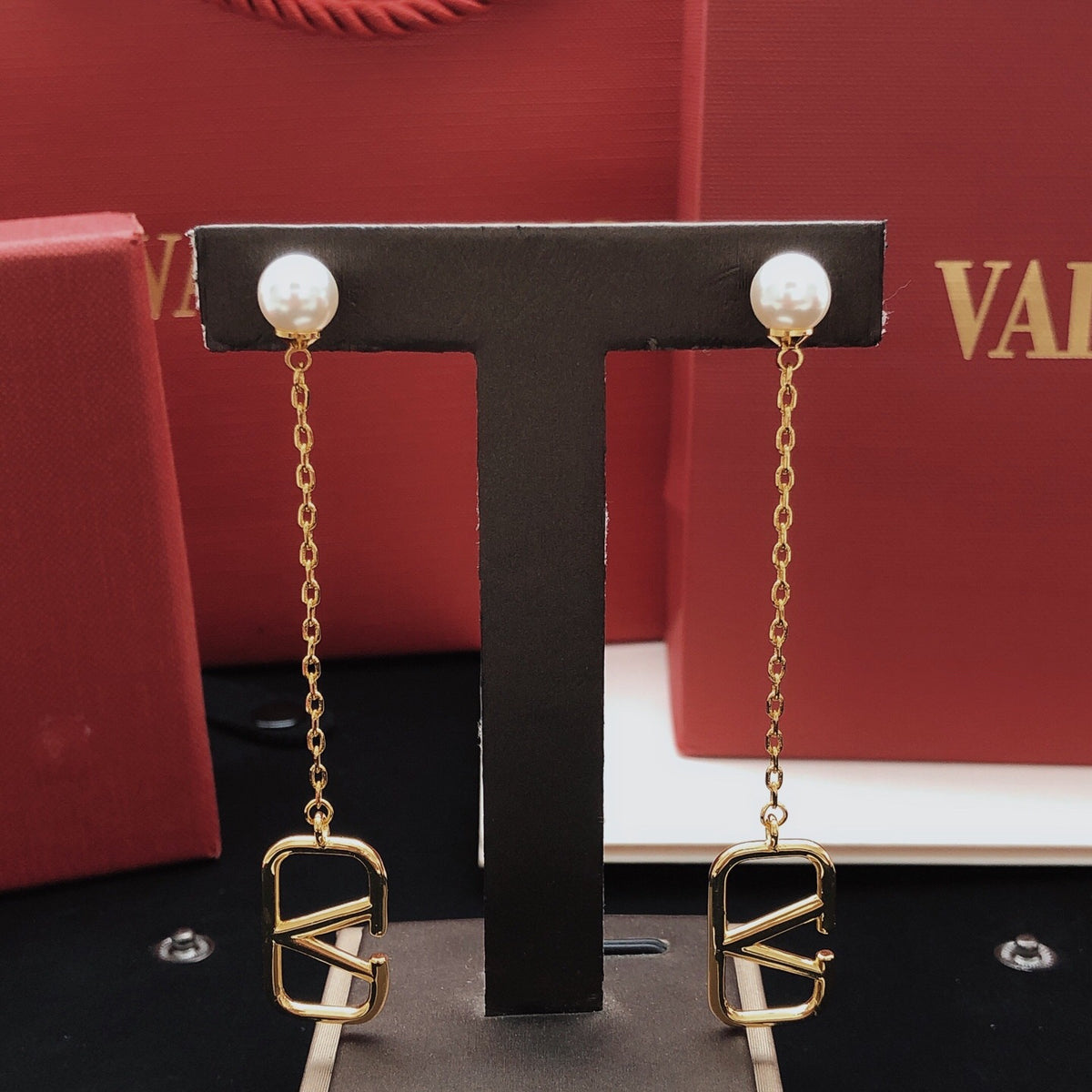 Signature Emblem Stud Earrings in Gold-Tone – Design 05 styled detail