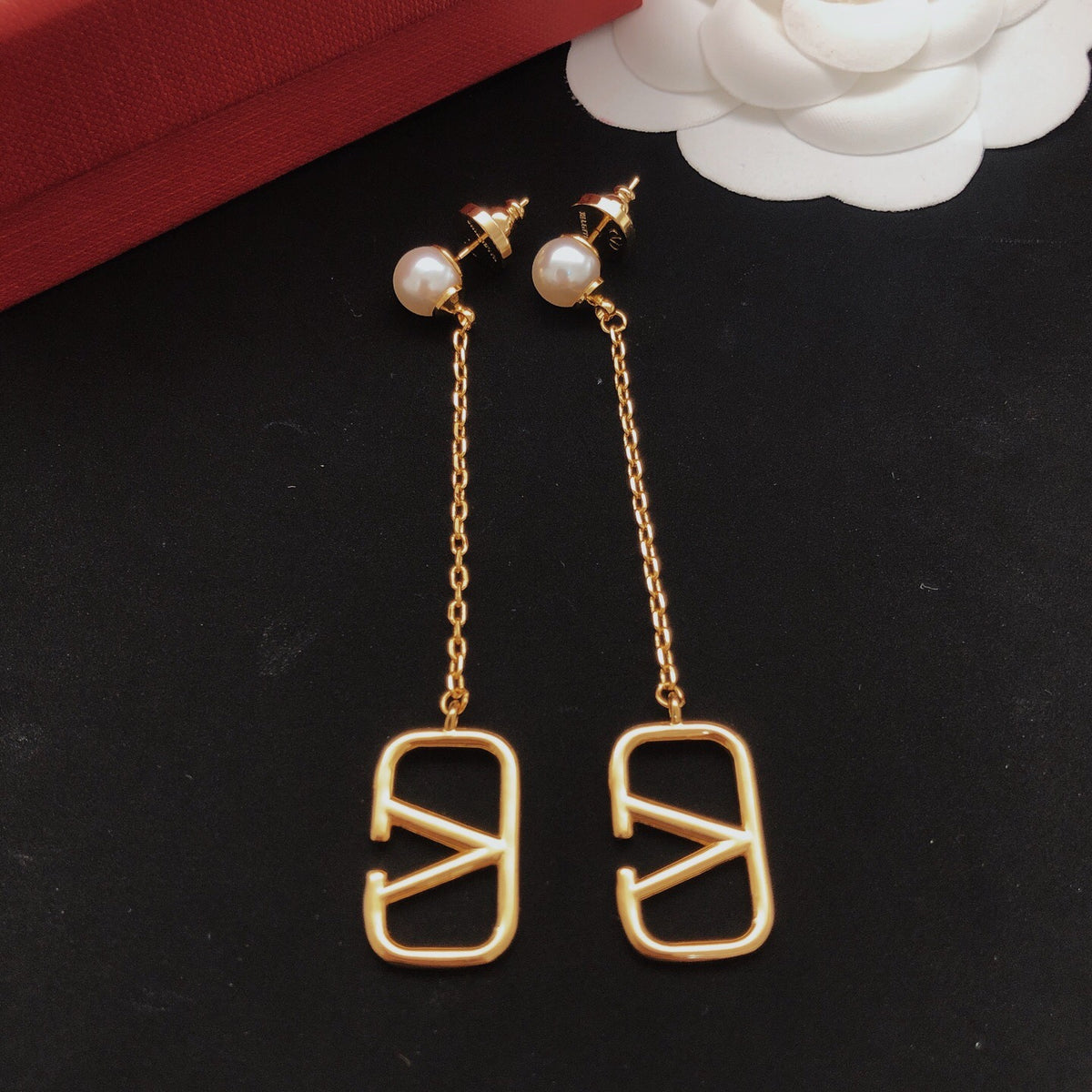 Signature Emblem Stud Earrings in Gold-Tone – Design 05 close-up view