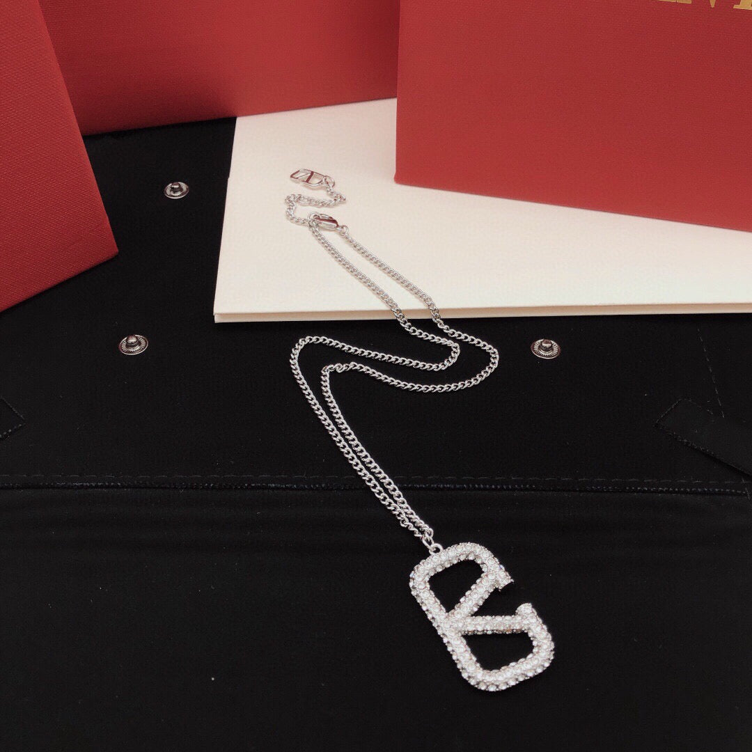 V Emblem Crystal-Accent Pendant Necklace – Design 03 styled detail