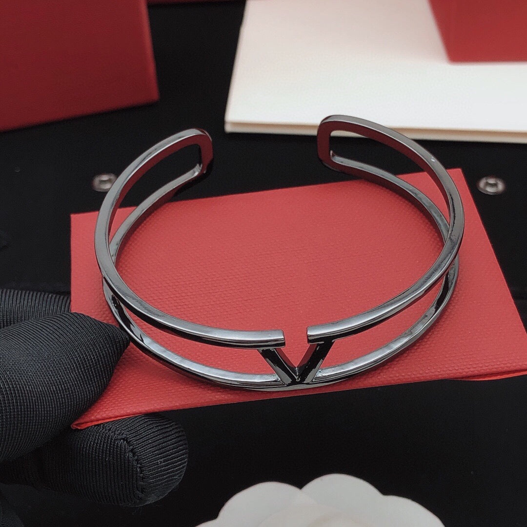 Signature Emblem Cuff Bracelet in Gold-Tone – Black side detail