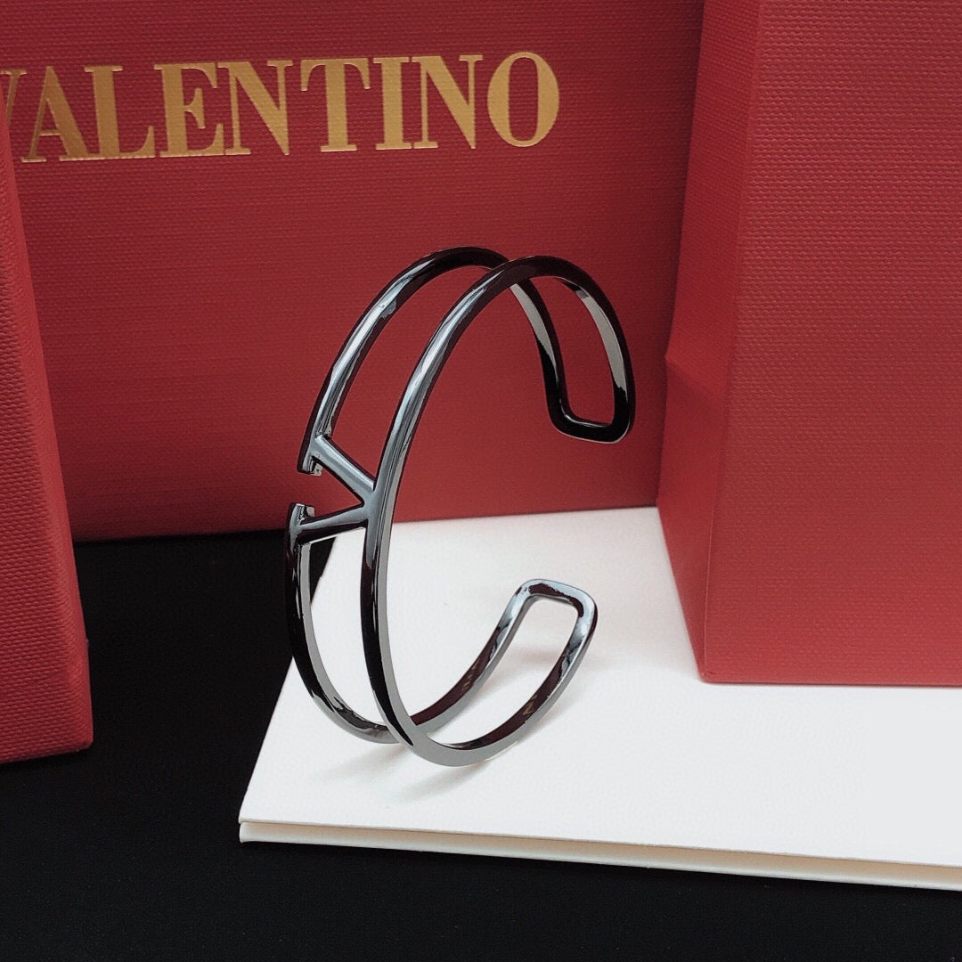 Signature Emblem Cuff Bracelet in Gold-Tone – Black front view