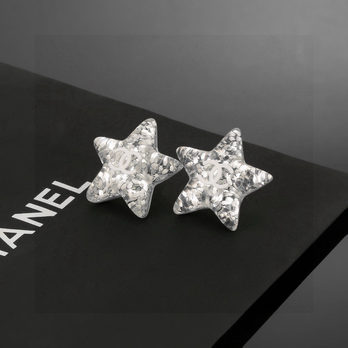 Double-C Emblem Stud Earrings in Silver-Tone – Star Detail – Design 006 front product view