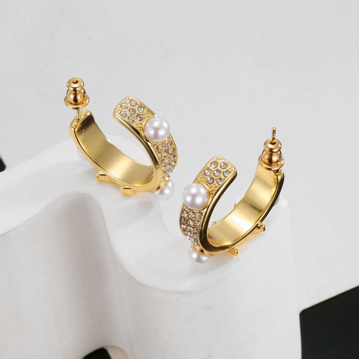 Letter Emblem Stud Earrings in Polished Metal-Tone – Design 039 close-up detail