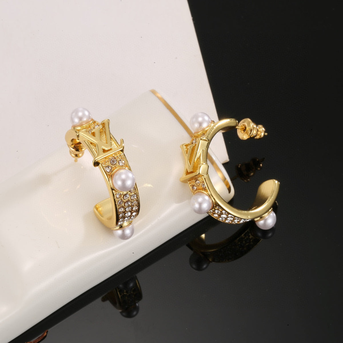 Letter Emblem Stud Earrings in Polished Metal-Tone – Design 028 detail view
