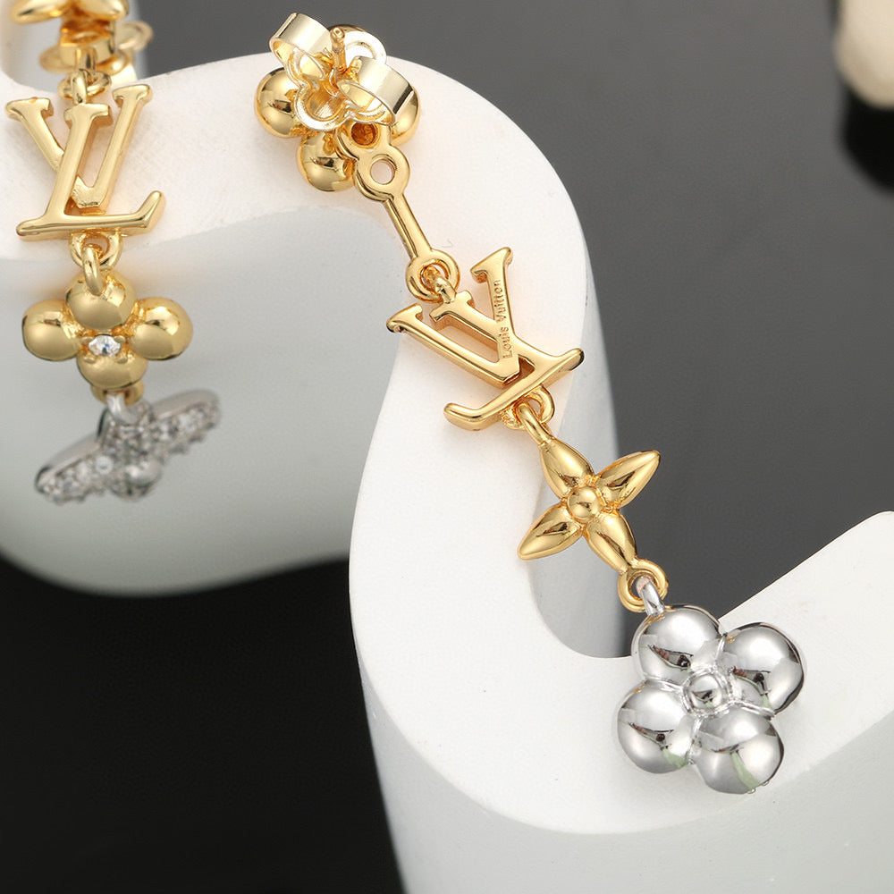 Letter Emblem Stud Earrings in Polished Metal-Tone – Design 038 detail view