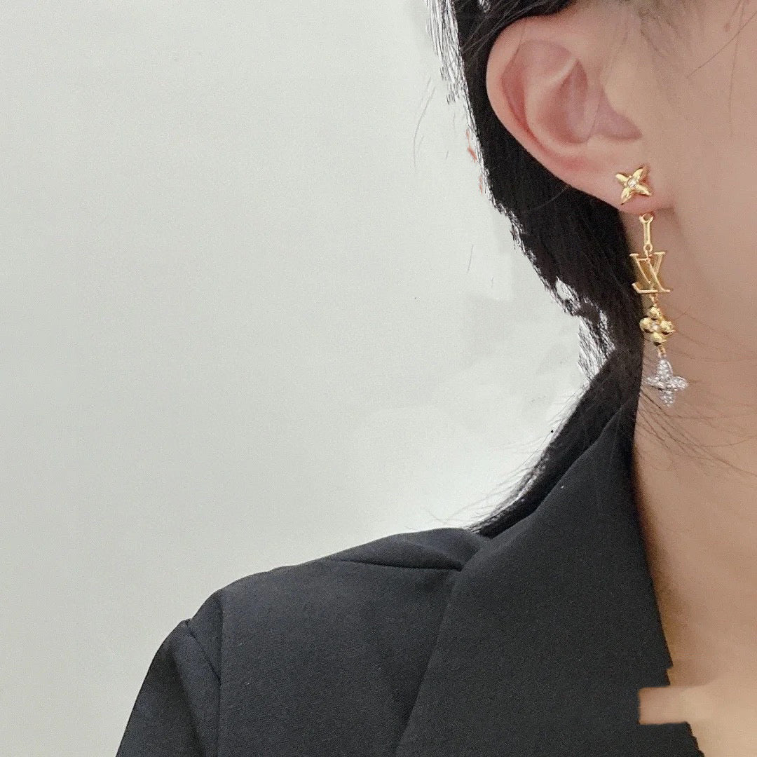 Letter Emblem Stud Earrings in Polished Metal-Tone – Design 038 close-up detail