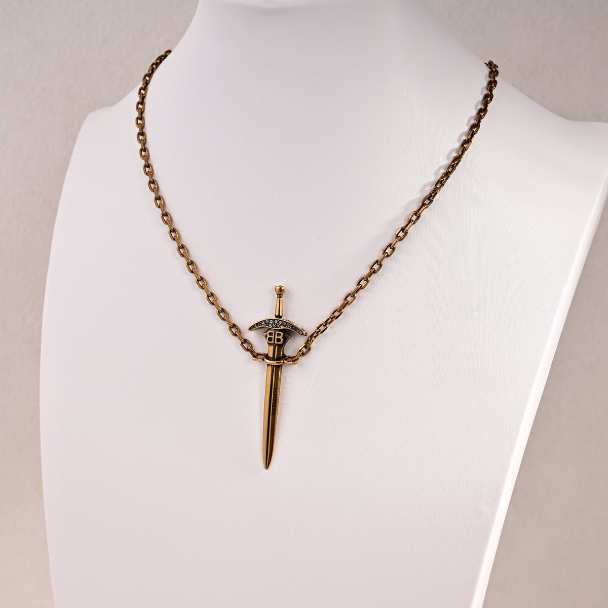 Geometric Emblem Pendant Necklace in Gold-Tone – Design 007 styled product view