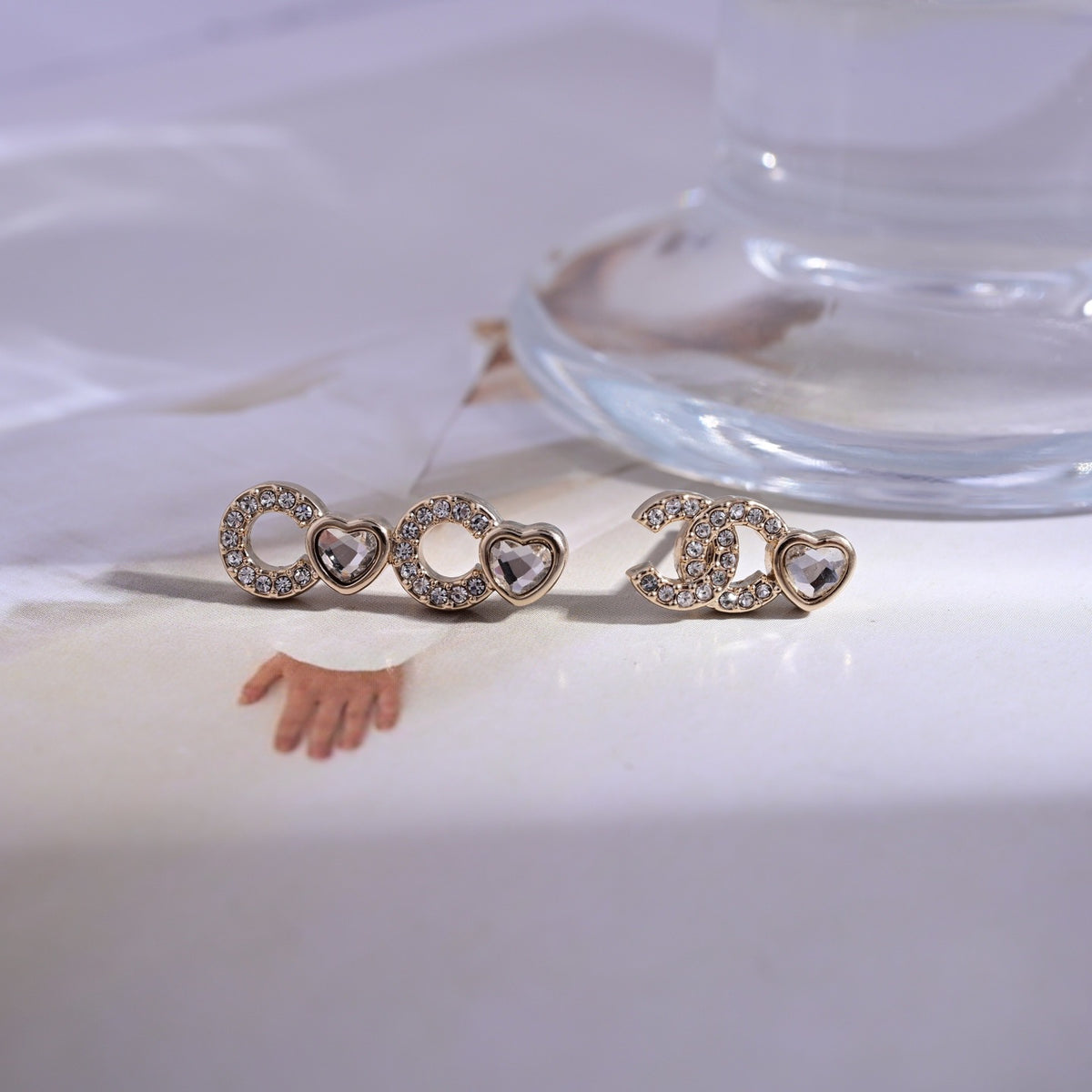 Signature Emblem Stud Earrings in Polished Metal-Tone – Design 107 styled product view