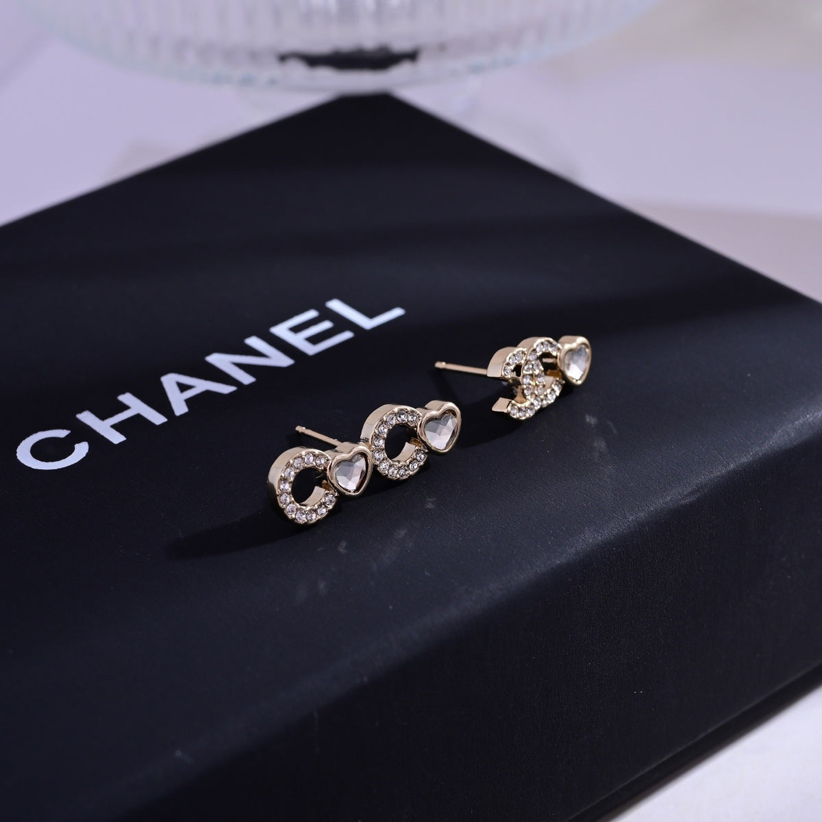 Signature Emblem Stud Earrings in Polished Metal-Tone – Design 107 front product view