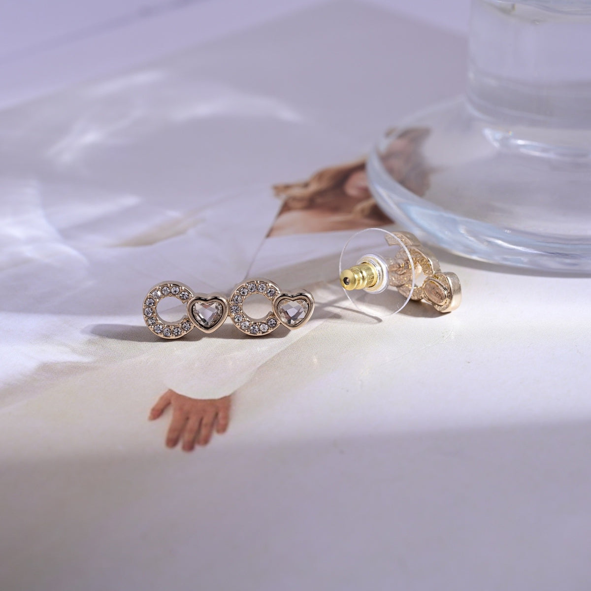 Signature Emblem Stud Earrings in Polished Metal-Tone – Design 107 detail view