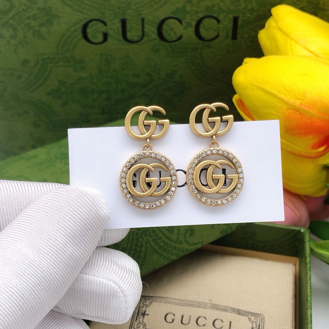 Geometric Emblem Stud Earrings in Polished Metal-Tone – Design 039 front product view