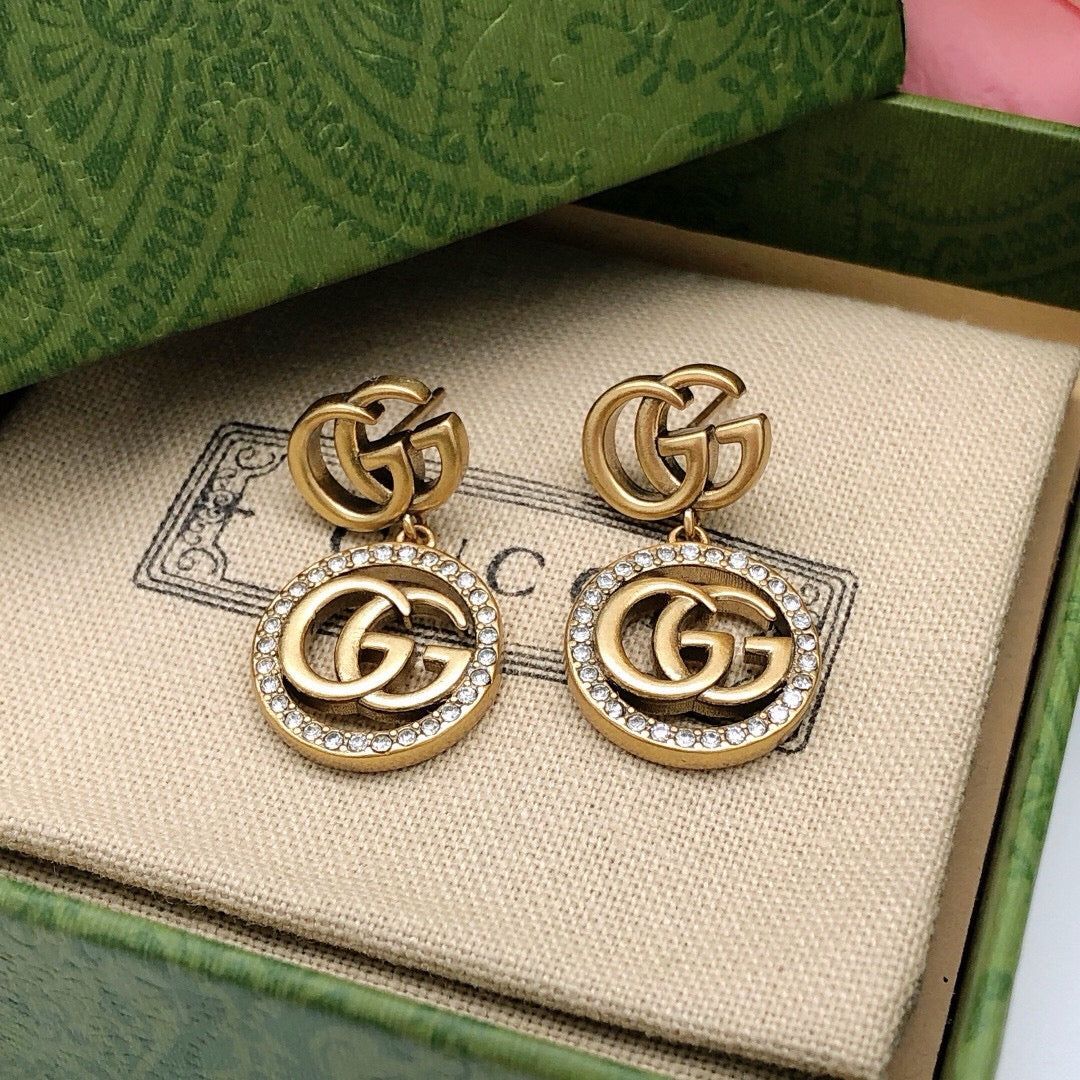 Geometric Emblem Stud Earrings in Polished Metal-Tone – Design 039 front product view