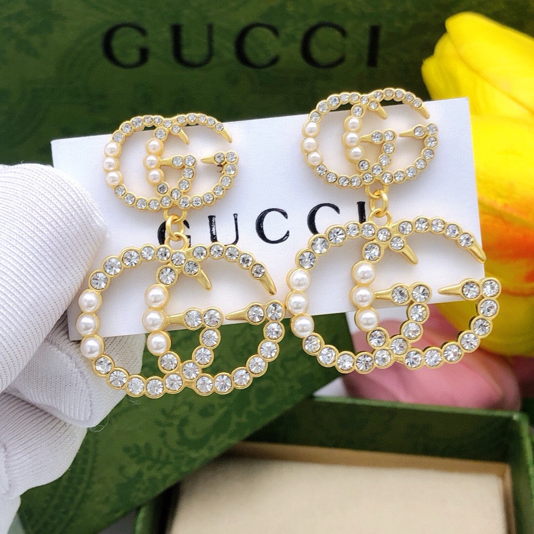 Double-G Emblem Stud Earrings in Polished Metal-Tone – Design 030 main product view