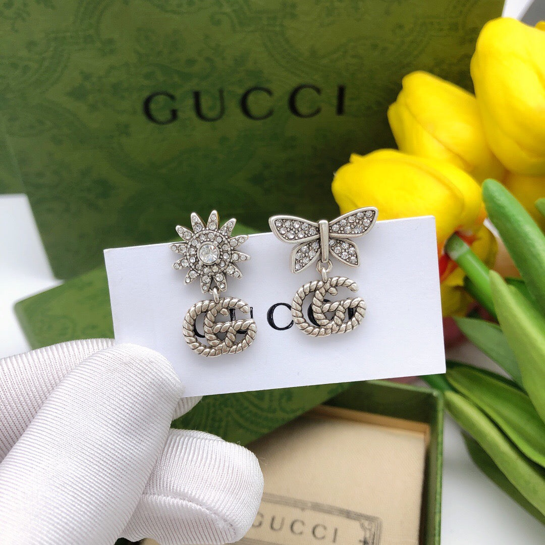 Double-G Emblem Stud Earrings in Polished Metal-Tone – Design 028 front product view