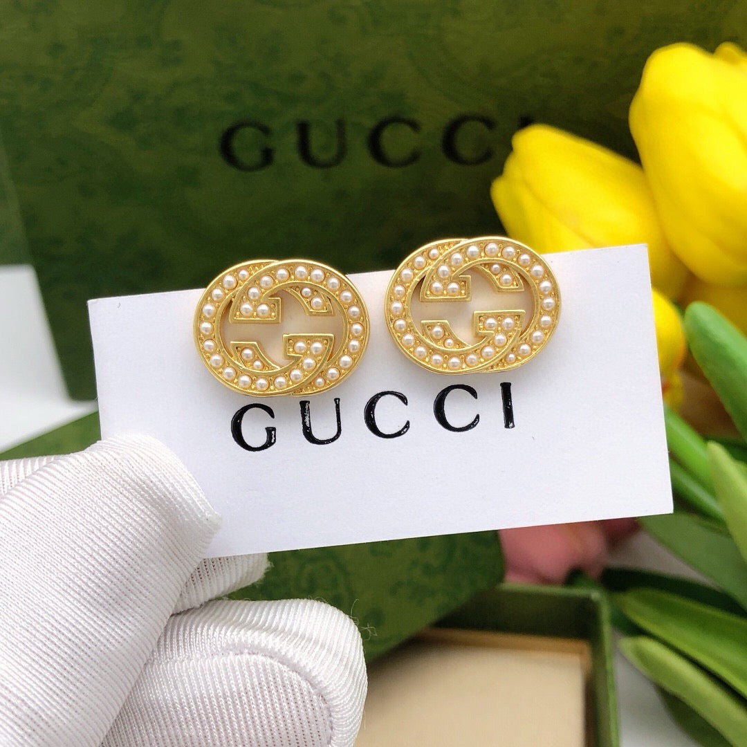 Double-G Emblem Stud Earrings in Polished Metal-Tone – Design 027 main product view