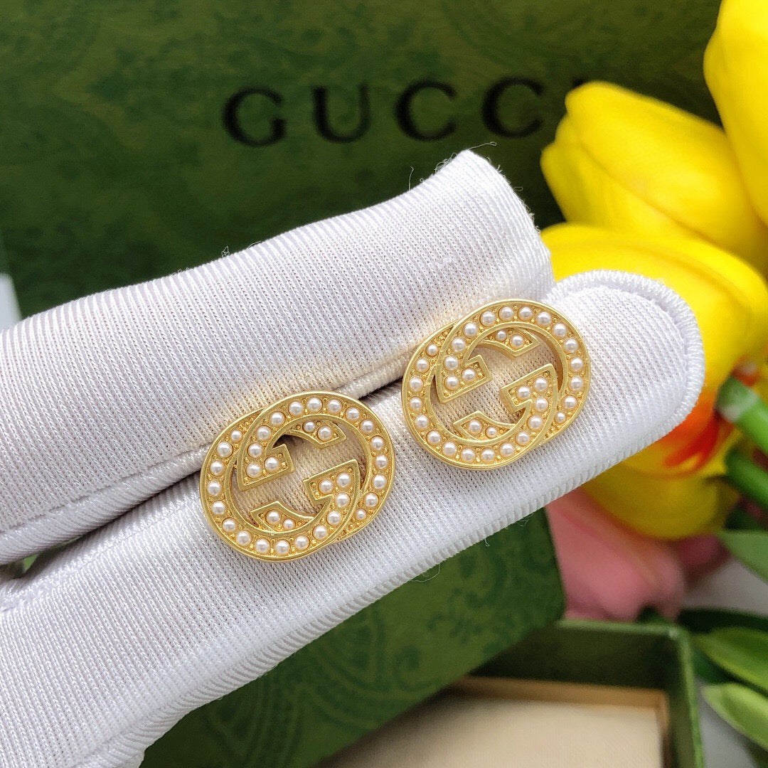 Double-G Emblem Stud Earrings in Polished Metal-Tone – Design 027 detail view