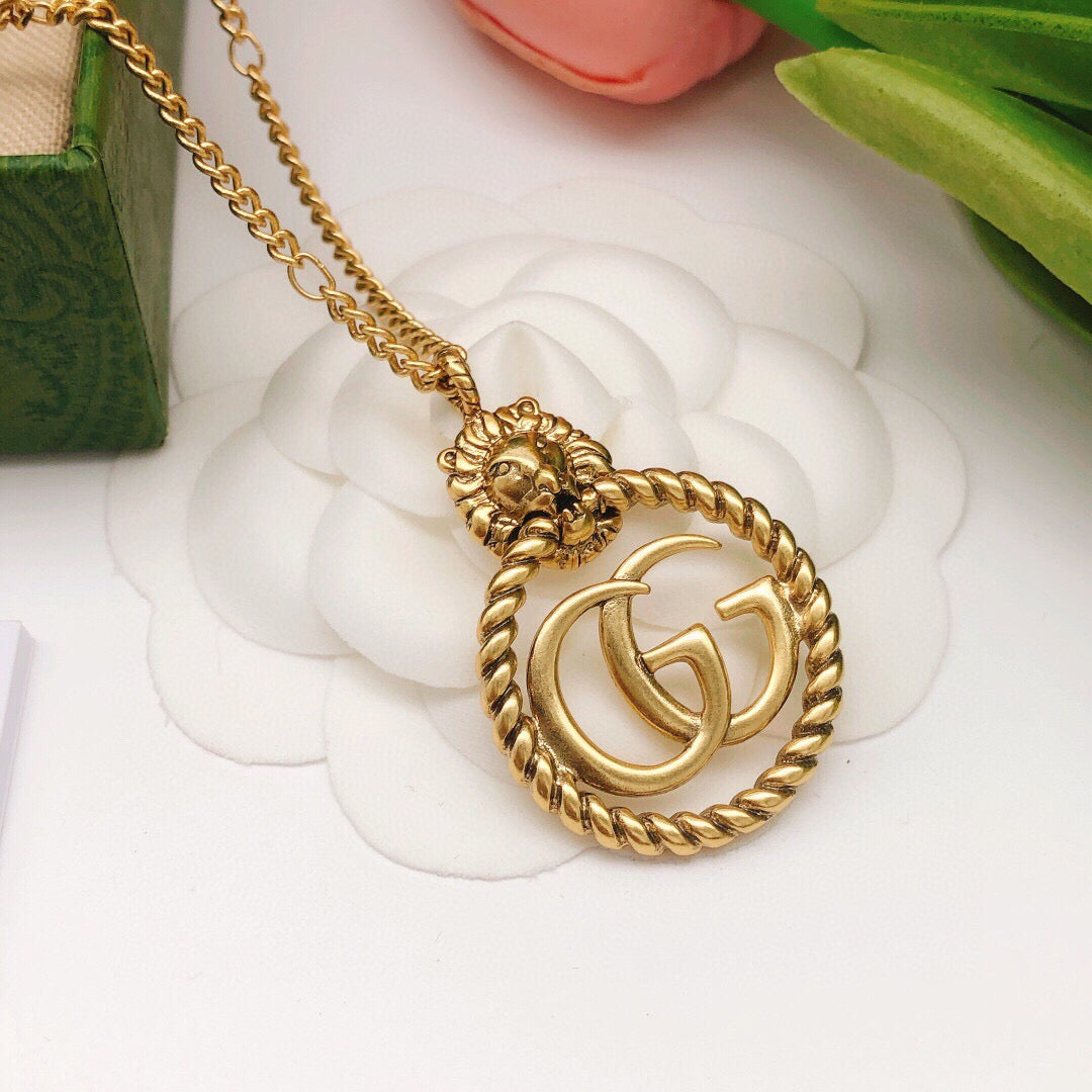 Double-G Emblem Pendant Necklace in Polished Metal-Tone – Vintage Detail – Design 037 main product view