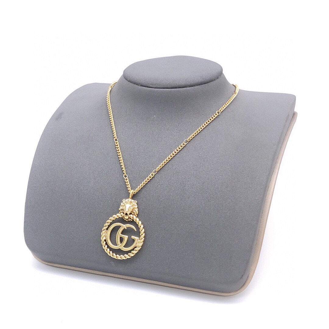Double-G Emblem Pendant Necklace in Polished Metal-Tone – Vintage Detail – Design 037 styled product view
