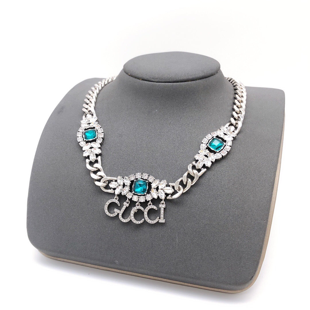 Double-G Emblem Pendant Necklace in Polished Metal-Tone – Design 140 main product view