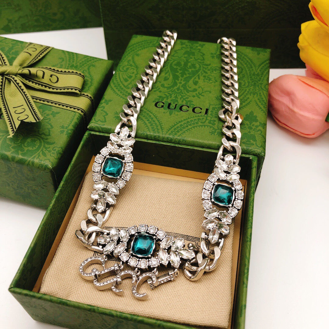 Double-G Emblem Pendant Necklace in Polished Metal-Tone – Design 140 detail view