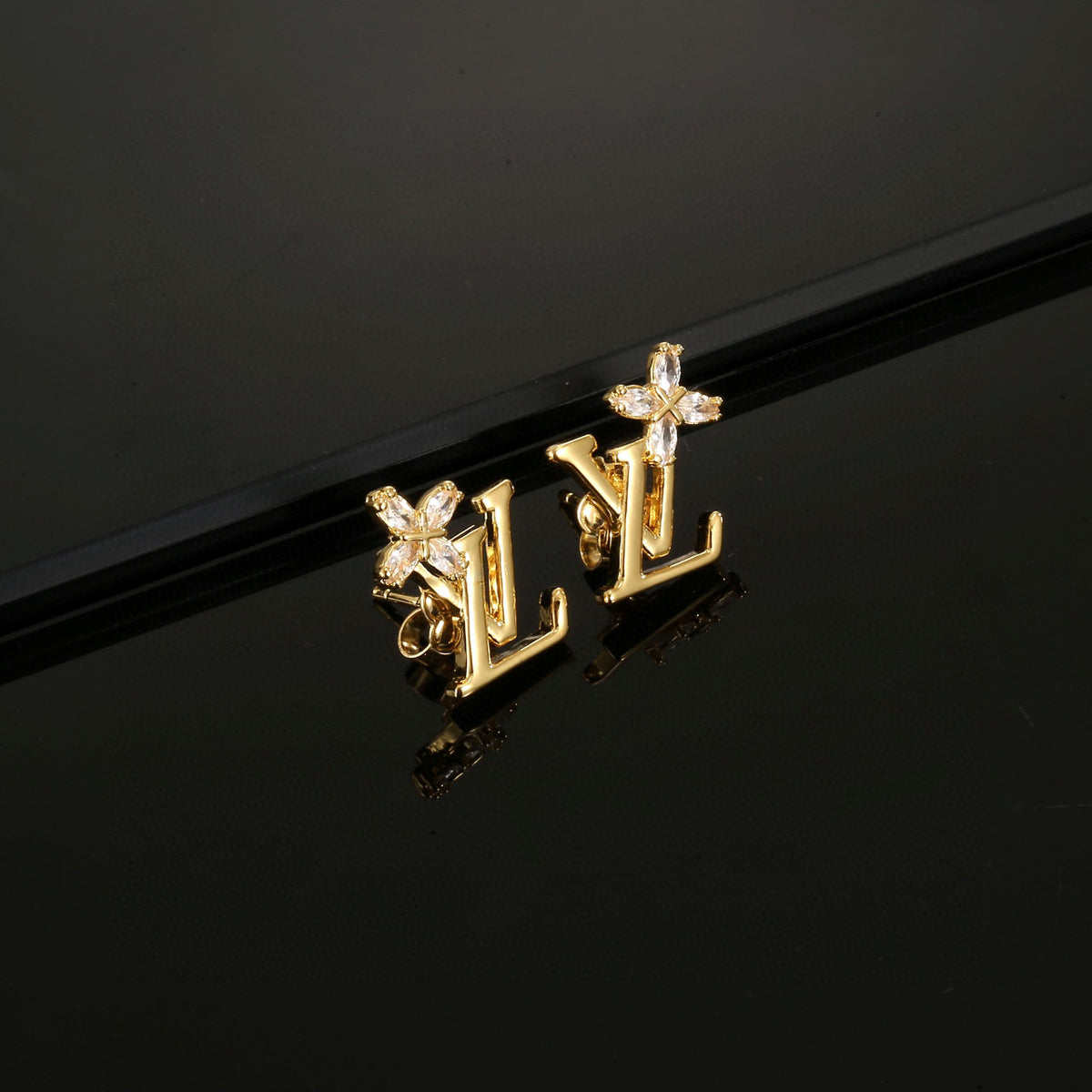 Geometric Emblem Stud Earrings in Polished Metal-Tone – Design 047 front product view