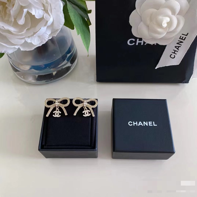 Double-C Emblem Stud Earrings in Polished Metal-Tone – Design 383 front product view