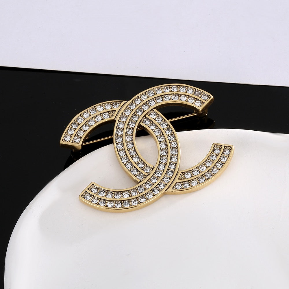 Double-C Emblem Brooch in Gold-Tone – Design 026 styled product view