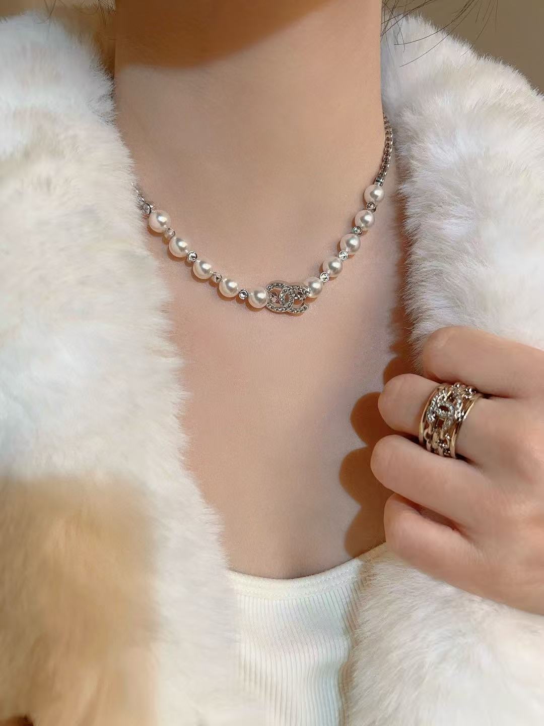 Double-C Emblem Pearl-Detail Pendant Necklace – Pearl Detail – Design 119 styled product view