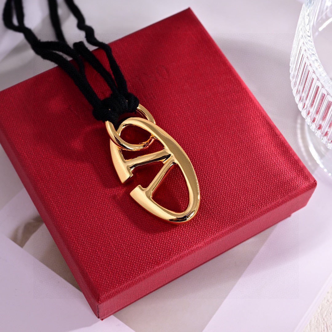 Signature Emblem Pendant Necklace in Polished Metal-Tone – Design 09 side detail